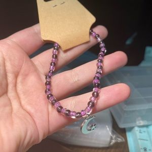 Purple moon charmed bracelet beaded